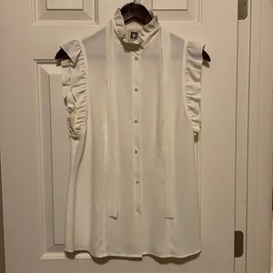 White sleeveless blouse